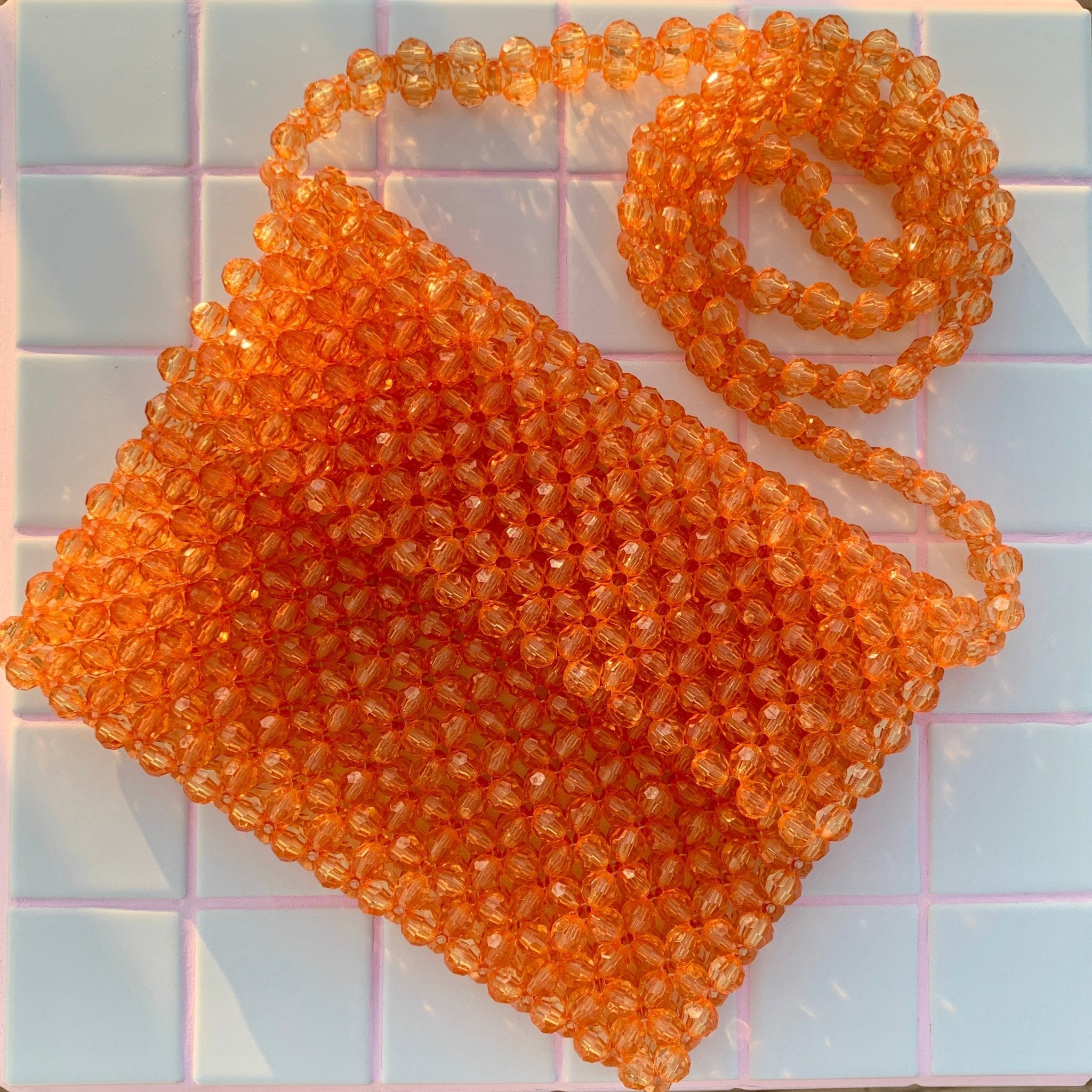 Orange beaded bag sale